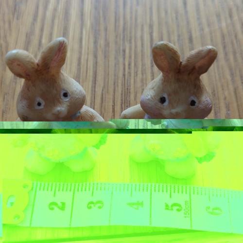 Pair brown rabbit figurine - of,